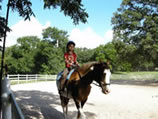 child on horse